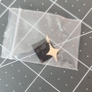 Miranda Frye Star Charm